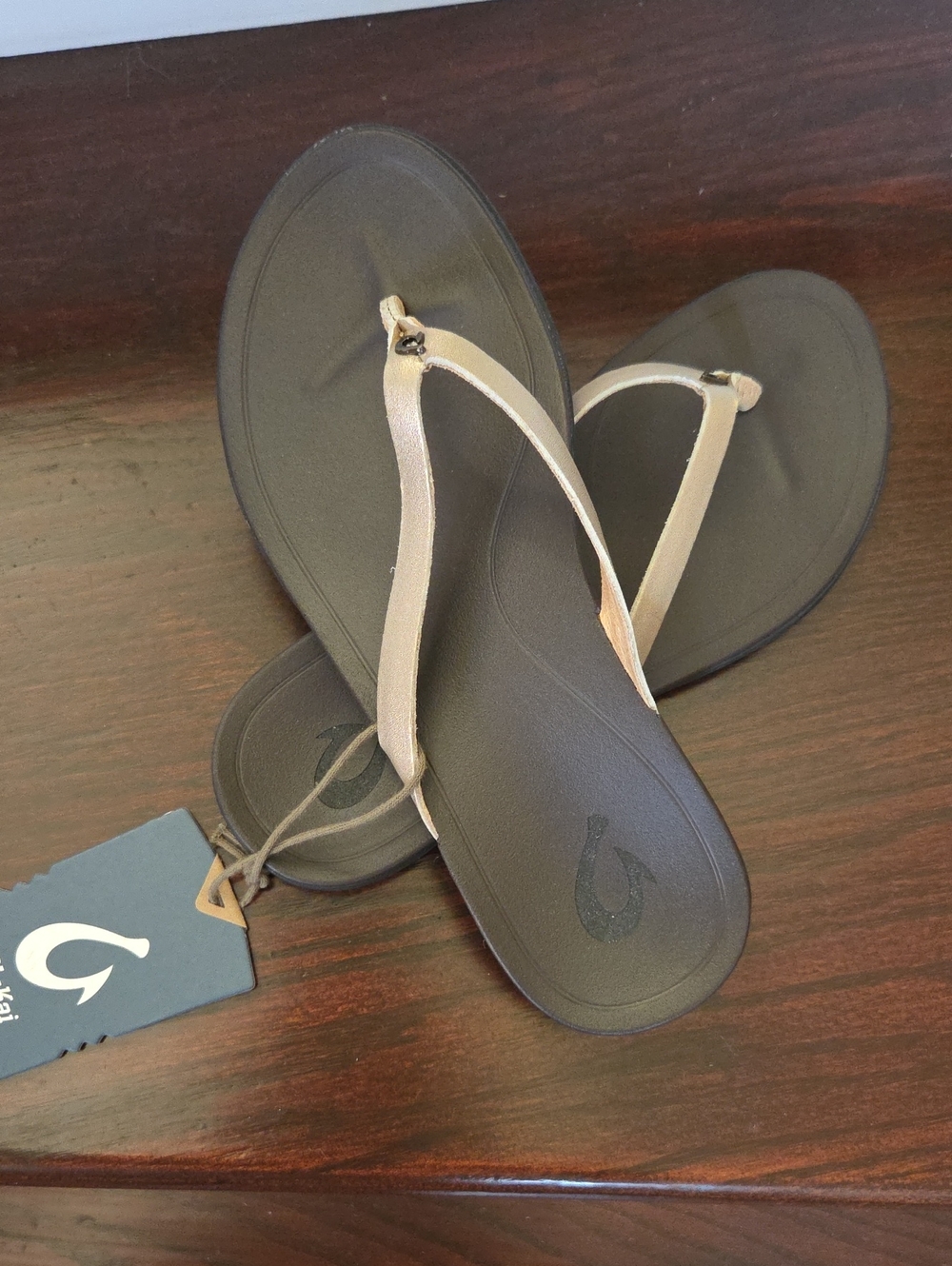 OluKai Women's Metallic Taupe and Dark Brown Flip Flop Sandals